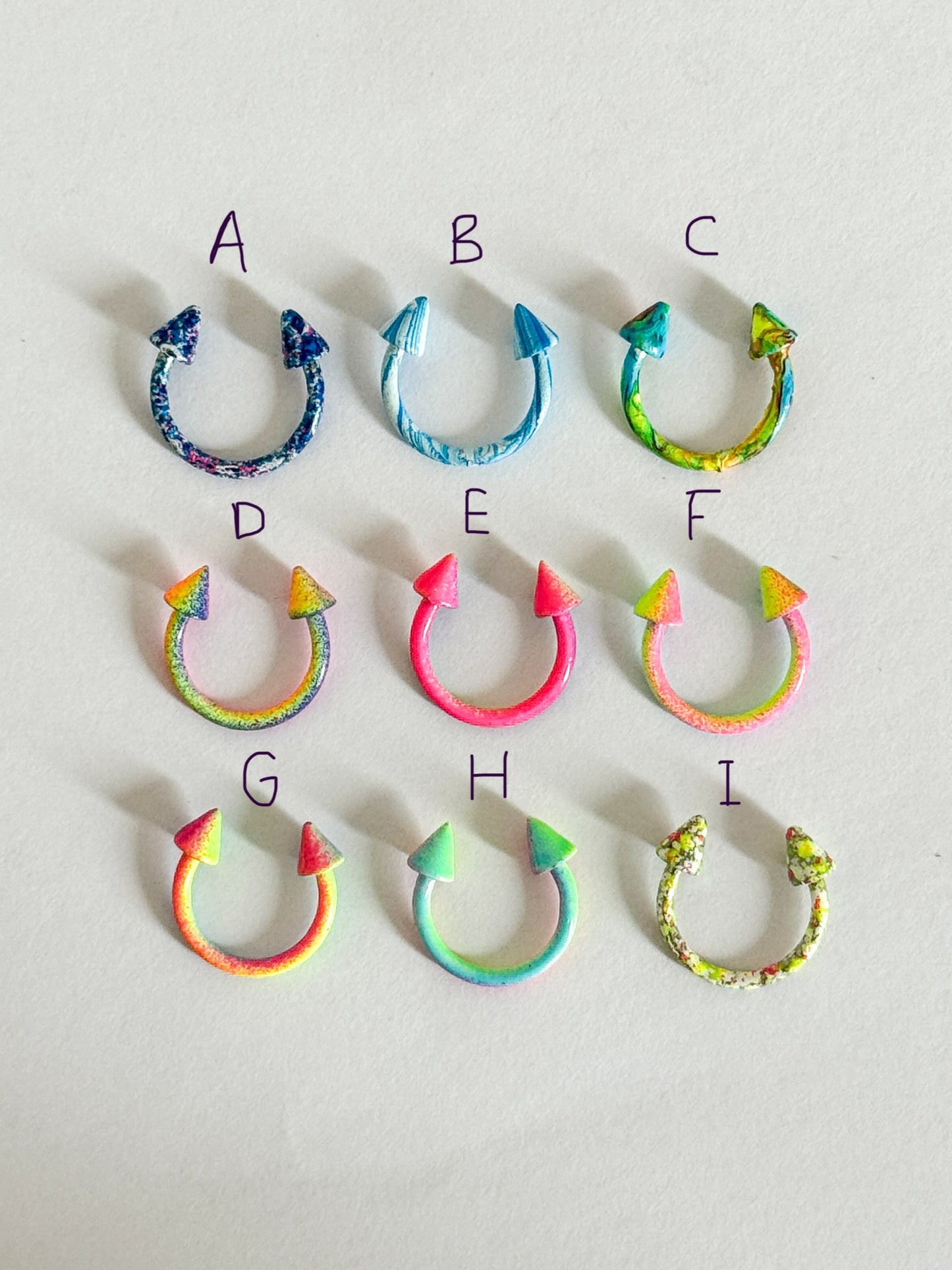 Circular Horseshoe Spike Color Barbell